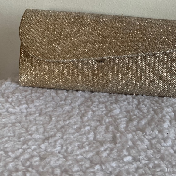 Handbags - Shiny gold clutch with optional linked straps